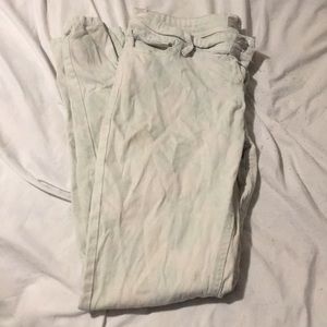 Pale green and white skinny jeans